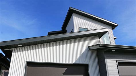 vertical metal siding on house|metal vertical siding residential.